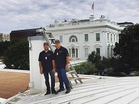 Tom, left, and John Meredith pause during an inspection of a chimney on the Oval Office on Aug. 9 in Washington, D.C. The Merediths inspected seven chimneys in the West Wing of the White House. Photo supplied