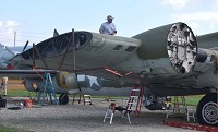 BOMBER: The dismantling of Grissom's B-17 continued Wednesday by All Coast Aircraft Recovery. The B-17 will be taken to Macon, Georgia. Staff photo by Daniel Herda