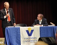 Stephen Dillon, left, an attorney and activist with the National Organization for Reform of Marijuana Laws, argues in favor of the legalization of marijuana while Vincennes University English professor Mike Mullen listens during the public debate sponsored by VU&rsquo;s Center for Research and Learning on Tuesday morning in the Red Skelton Performing Arts Center. Staff photo by Gayle R. Robbins