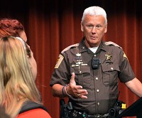 Knox County Sheriff Mike Morris answers questions following the debate over the legalization of marijuana in Indiana on Tuesday morning at the Red Skelton Performing Arts Center. Morris and Rob Evans, professor of sociology at Vincennes University who is a certified drug and alcohol counselor, spoke against legalization. Staff photo by Gayle R. Robbins