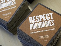 Respect Boundaries coasters are among the items inside bags passed out during the Take Back the Night rally on April 30. Nearly a quarter of female undergraduates reported non-consensual sexual contact since enrolling in college, according to a survey released Monday of 150,000 students on 27 campuses nationwide, including Purdue University. (Photo: John Terhune/Journal &amp; Courier)