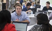 Andrew Wiand, executive director of enFocus, speaks to attendees Tuesday at an "edit-a-thon" at Union Station Technology Center to teach residents to edit Wikipedia pages to enhance the digital profile of South Bend. SBT Photo/GREG SWIERCZ