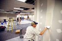 Hayes Brothers employee Shawn Miller works on the new co-working space at Inventrek on Aug. 21, 2015.Tim Bath | Kokomo Tribune