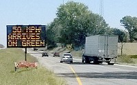 This message board on Ind. 37 near the stoplight at Ind. 144 is INDOT's new testing device, which tells driver what speed to drive as they approach a stoplight to hit it on green. Courtesy photo