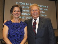 Carrying on: Mary Kramer, executive director of ArtSpaces, poses with Jim Eifert, one of the founders of the organization.In 10 years they have placed 15 sculptures around Terre Haute, with three more planned by the end of the year. Staff photo by Jim Avelis