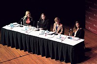 From left, panelists Kelley Curran, with the Homeless Coalition of Southern Indiana, Christine Harbeson, with Hope Southern Indiana, Beth Keeney, with the LifeSpring Foundation of Southern Indiana, and Leslea Townsend, with St. Elizabeth Catholic Charities are pictured on stage in the Ogle Center during the News and Tribune and Indiana University Southeast sponsored Facing Homelessness: A Community Conversation forum at IUS on Tuesday evening. Staff photo by Christopher Fryer