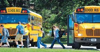 Greenfield-Central High School srudents board buses for their trip home during a recent school dismissal. Staff photo by Tom Russo