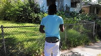The fashion choice of wearing one's pants lower than the natural waist may soon be the subject of a city ordinance. J.J. Armstrong, shown at 45th Avenue and Connecticut Street in Gary, questioned enforcement of the proposal. (Michelle Quinn, Post-Tribune)