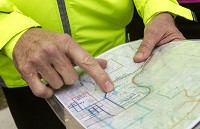Indianapolis consultant Kennth Remenschneider reviews the planned bike route for Thursday's trip. Staffphoto by Rich Janzaruk