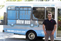 South Shore Brew Bus owner Chris Hill with the bus in Valparaiso. Staff photo by Jonathan Miano