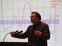 Purdue University economist Larry DeBoer discusses Saturday, Jan. 16, 2016, the issues state legislators face in deciding how to create additional funding for Indiana's roads. (Photo: Taya Flores/Journal &amp; Courier)