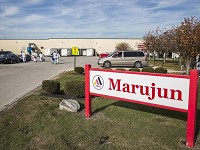 First-shift employees exit the Marujun factory in Winchester Wednesday, Nov. 11, 2015. The factory, which employs more than 750 workers, was slated to close by November 2016, but is being sold to another company. (Photo: Jordan Kartholl/The Star Press)