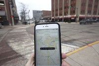 The "ride-sharing" service Uber allows people looking for a ride to use the company's smartphone app to find nearby drivers who are willing to give them a lift. The service entered the South Bend market in August 2014. Tribune Photo/SANTIAGO FLORES