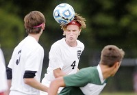 Anderson's Bryler Hamm clears the ball with a header as the Indians hosted the Pendleton Heights Arabians in this file photo from 2015. State Sen. Tim Lanane, D-Anderson, is the author of legislation that would extend concussion protocols to all sports in Indiana and from the fifth to the 12th grades. Staff photo by Don Knight
