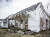 Blighted housing at 623 W. Memorial sits in disrepair Monday afternoon. Delaware County Commissioners hoping to find new owners for hundreds of homes just like these.&nbsp; Staff photo by Corey Ohlenkamp
