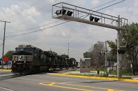 A freight train crosses 169th Street just east of Kennedy Avenue in Hammond in this July 2015 file photo. Staff file photoby John J. Watkins