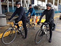 Just after getting off the South Shore train on Saturday, Chicago residents, from left, Serge Lubomudrov, Alex Durbak and Bob (he didn't give his last name) depart for brewery tour on their bikes. Tribune Photo/JOSEPH DITS
