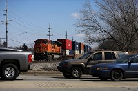 A BNSF train parked just before the Grant Trunk crossing on Calumet Avenue in Munster where train traffic sometimes blocks vehicular trafffic. Staff photo by Jonathan Miano