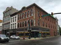 The building with two storefronts in the 100 block of South Walnut Street that is up for sale. (Photo: Keith Roysdon / The Star Press)