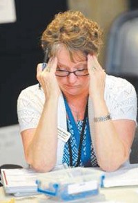 Hancock County Clerk Marcia Moore. More than 2,000 ballots from Hancock County voters remained in flux Tuesday night because of a computer glitch, and results from several races were delayed. (Tom Russo | Daily Reporter)