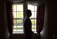 Luis, an undocumented immigrant shown here in his Elkhart home, lives in fear that he might be one day deported to Mexico. (Elkhart Truth photo/Sam Householder)
