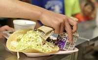 Lunches are served for free at Orleans Elementary School in Orange County as part of the Summer Food Service Program offered at various schools in the state. Times-Mail photo by Rich Janzaruk
