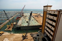 Cranes on barges and land construct a mammoth barge in 1007 to hold the new $500 Vagas-quality Horseshoe Casino thaat replaced the original gambling boat that opened there in 1996. Times of Northwest Indiana file photo