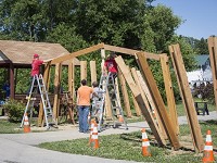 Ball State Architecture students continue building an art instillation at the intersection of Tiger Drive and River Road along the trail network. The project came about after collaboration between Ball State and the Yorktown Arts Council. Staff photo by Corey Ohlenkamp