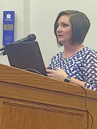 Boone County Public Health Nurse Brandy Franklin presents her research on needle exchanges during the Boone County Council meeting on Tuesday, Aug. 8, 2017. Staff photo by Leeann Doerflein