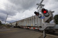 A train heads east of the tracks just south of Jefferson Street near the 26th Street intersection in South Bend on Friday. Staff photo by Michael Caterina