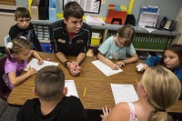 Mya Uebelhor, left, Xavier Young, third grade teacher Brock Moeller, Kaitlyn Fuhrman, Mia Shaw, Adilynn Foster and Henry Hostetter worked on a project Wednesday morning at Tenth Street Elementary School. Staff photo by Jacob Wiegand