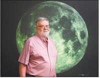  Jay Melosh, a Purdue distinguished professor of earth, atmospheric and planetary sciences, stands in front of a map showing the moon&rsquo;s gravity field. Photo by  Mark Simons | Purdue University
