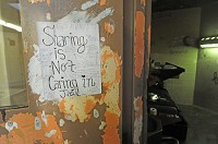 A sign made by an inmate outside her cell door at the Hancock County Jail. Staff photo by Tom Russo