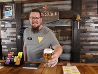 Curator Mike Vanaman serves up a glass of Walking Ashland, a cream ale, Friday, March 2, 2018, at Brokerage Brewing Company, 2516 Covington Street in West Lafayette.&nbsp; Staff photo: John Terhune/Journal &amp; Courier