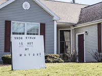A sign reading 'Shon Byrum is not my mayor' sits in the front yard of a home along South Meridian Street in Winchester, Indiana on Tuesday, March 6, 2018. Staff photo: by Mickey Shuey