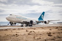 Made in Terre Haute: The new GE9X jet engine hung under the wing of a 747 readies for its first test flight in Victorville, California, on March 13. Some components of the GE9X engine are made at GE Aviation in Terre Haute.  General Electric photo