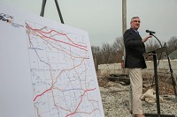 Gov. Eric Holcomb makes commets as he helps announce the Local Trax Rail Over Pass Program in Chesterton on Monday, April 2, 2018. Staff photo by John J. Watkins