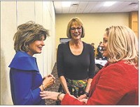 Lt. Gov. Suzanne Crouch, center, talks with Pepper Dillon Muhler, left, the external affairs director for AT&amp;T Indiana and Trish Whitcomb, the vice president of George K. Baum Indianapolis, at a Friday One Southern Indiana event. Staff photo by Danielle Grady