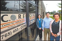  TREATMENT OPTION: The Center for Opiate Recovery (CORE) has started accepting patients. It specializes in medications to treat opioid addicts. Shown here are nurse practitioner Cara Berg Raunick, Dr. Adam Lenet and office manager Billie Hadley in front of the new Kokomo facility. Staff pPhoto by Tim Bath