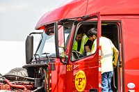 Student drivers Hassan Abourich, left, and Shahnawaz Khan check over the truck&rsquo;s hydraulic functions in the cab as part of the Mister &ldquo;P&rdquo; Express OTR Driving School. Staff photo by Tyler Stewart