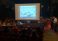 
Representatives from Remenschenider Associates present the first draft of Redkey&rsquo;s downtown revitalization plan to residents and local officials Monday during a meeting at Key Palace Theatre. The plan calls for new fa&ccedil;ades for some downtown buildings in addition to a extended bike and pedestrian trail. (Photo provided)

&nbsp;