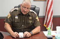 NARCAN: Huntington Sheriff Terry Stoffel showcases a dose of Narcan, which is a brand of Naloxone. Stoffel said the department currently has an estimated 50 doses on hand.