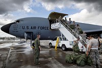 Men and women from the 434th Air Refueling Wing offload baggage and cargo upon arrival to Homestead Air Reserve Base, Fla., Sept. 12, 2017. Airmen from the Hoosier Wing deployed to Homestead to assist with Hurricane Irma recovery efforts. (U.S. Air Force photo/Tech. Sgt. Benjamin Mota)