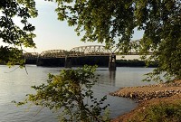 The Harmony Way Bridge, which connects New Harmony, Ind., to Southeastern Illinois over the Wabash River, is on the top-10 list of Indiana's most endangered landmarks. The bridge, which is on the National Register of Historic Places, remains open but is in need of repairs. Staff photo by Molly Bartels