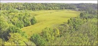 This photograph, taken with a drone, shows the 84 acres of agricultural fields and woods that were recently acquired by Sycamore Land Trust to be added to the Beanblossom Bottoms Nature Preserve. John Lawrence | courtesy photo