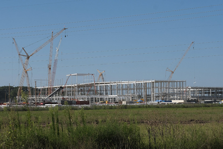 Last year, Indiana offered $186 million to automaker Stellantis for a $2.5 billion electric-vehicle battery plant in Kokomo, which is under construction and expected to open in 2025, creating up to 1,400 jobs. (IBJ photo/Eric Learned)