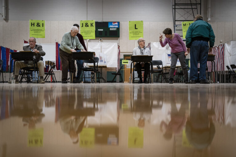 As their poll workers age, several counties have turned to students as an alternative. (Photo by Drew Angerer/Getty Images)