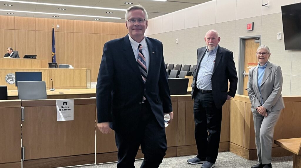 John Rust (left) leaves the courtroom Wednesday Nov. 1 after a hearing on his case to get on the Republican primary ballot for U.S. Senate. (Niki Kelly/Indiana Capital Chronicle)