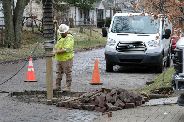 Citizens Energy Group is replacing lead pipes on Euclid Avenue near East Michigan Street in conjunction with the city’s work to convert East Michigan and East New York streets from one-way traffic to two-way. (IBJ photo/Eric Learned)