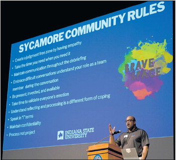 Joshua Elmore, assistant director of student support and accountability at Indiana State University, goes over the Sycamore Community Rules during a student listening session in University Hall on Tuesday on the ISU campus. Tribune-Star/Joseph C. Garza